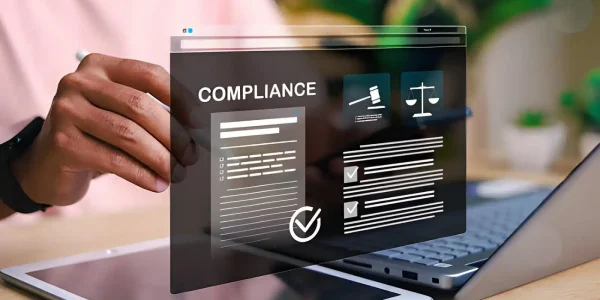 Rules & Regulations of your association Digital compliance checklist with completed items displayed over a laptop and tablet